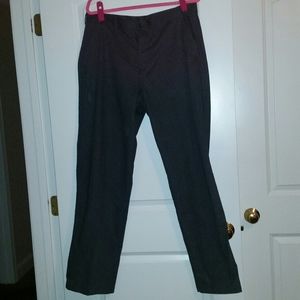 Mens dark grey flannel trousers.